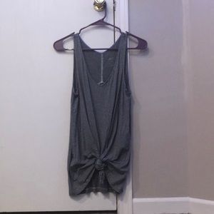 black and white striped tanktop with twist knot at bottom